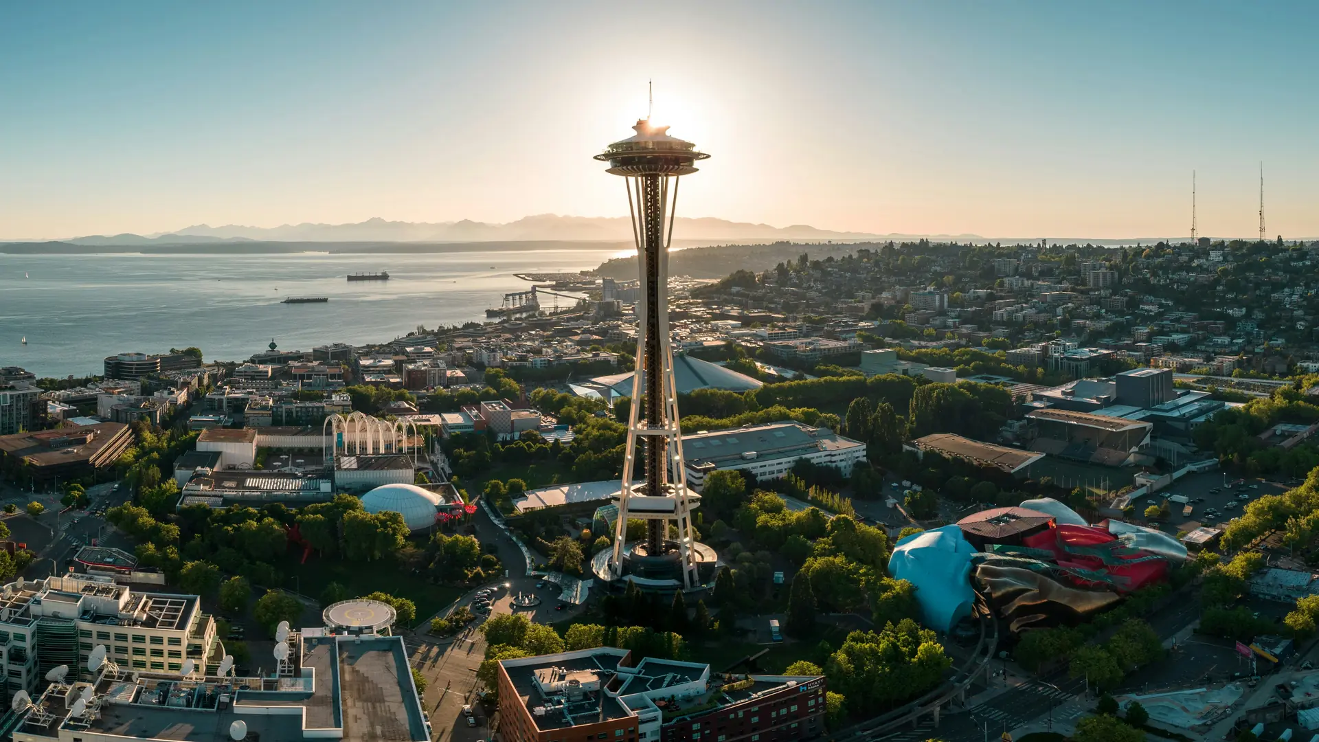 The Space Needle and Seattle skyline with Mount Rainier in the distance